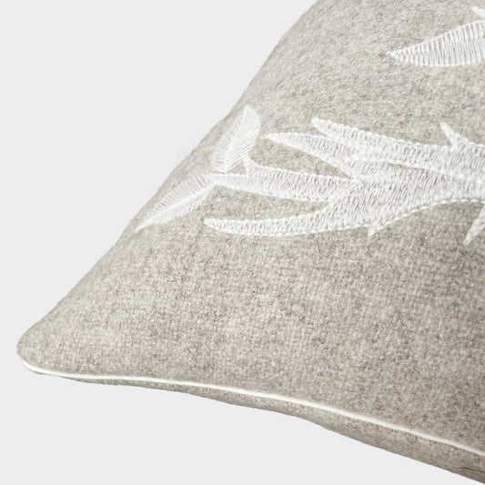 Melange wool cushion with fir embroidery
