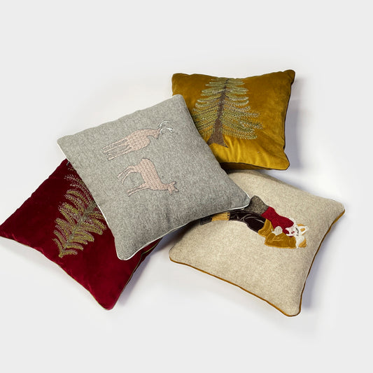 Melange wool cushion with fir embroidery