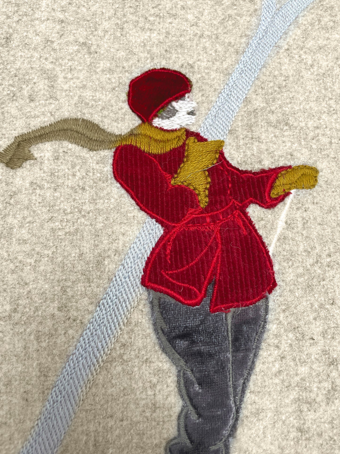 Melange wool cushion with trampoline embroidery