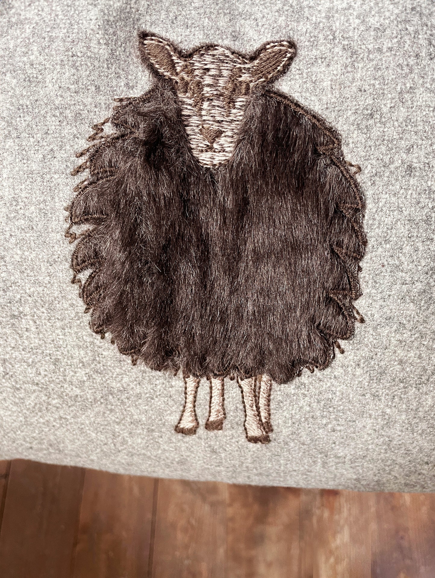 Melange wool sheep cushion