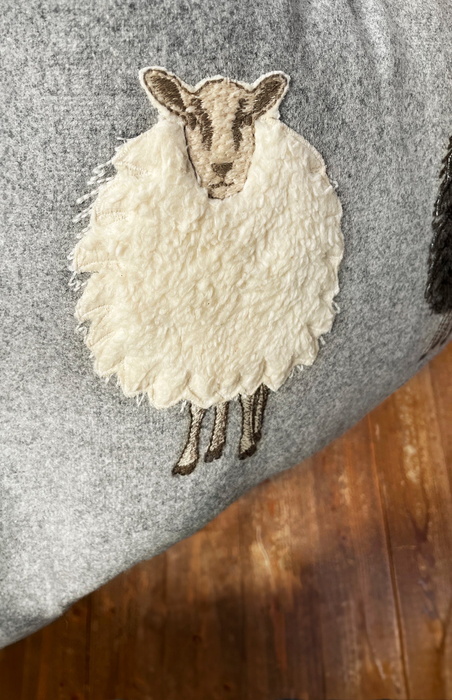Melange wool sheep cushion