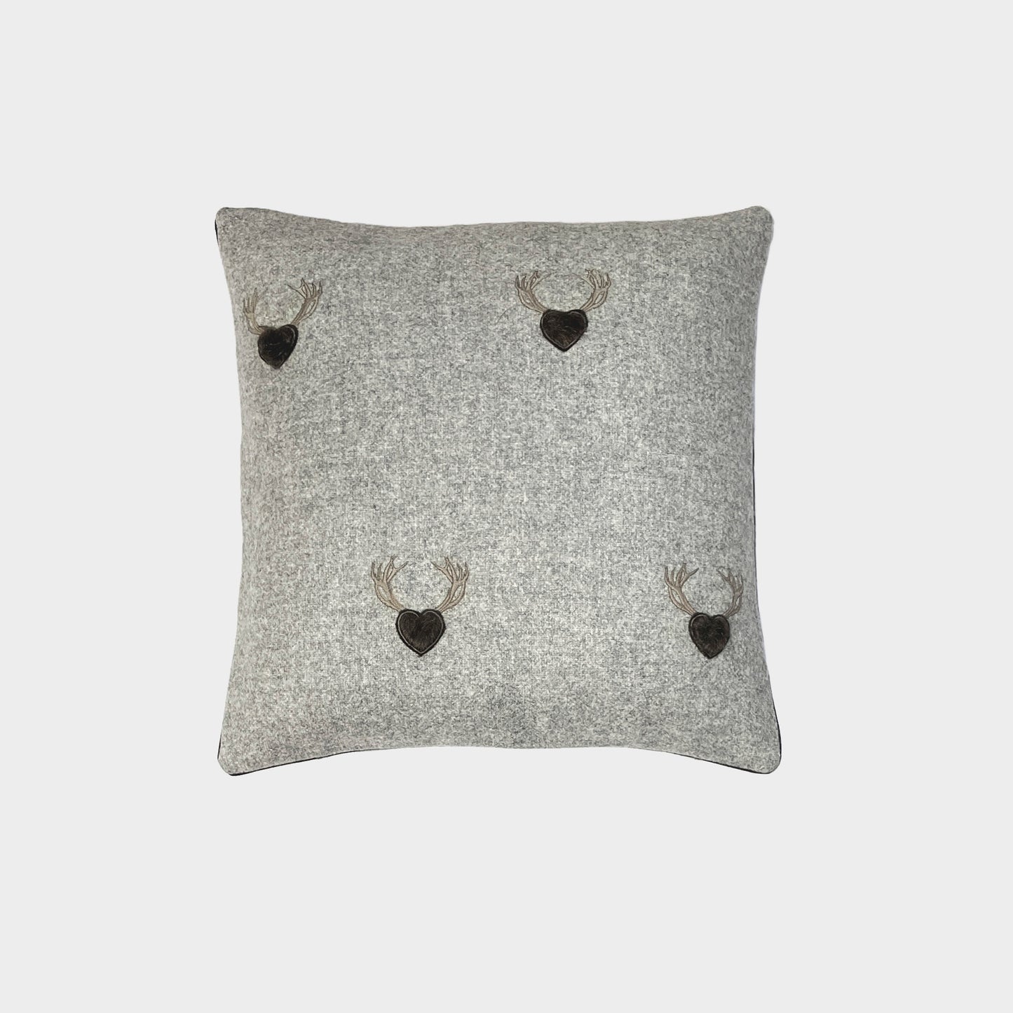 Melange wool cushion with fir embroidery