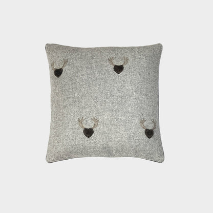 Melange wool cushion with fir embroidery