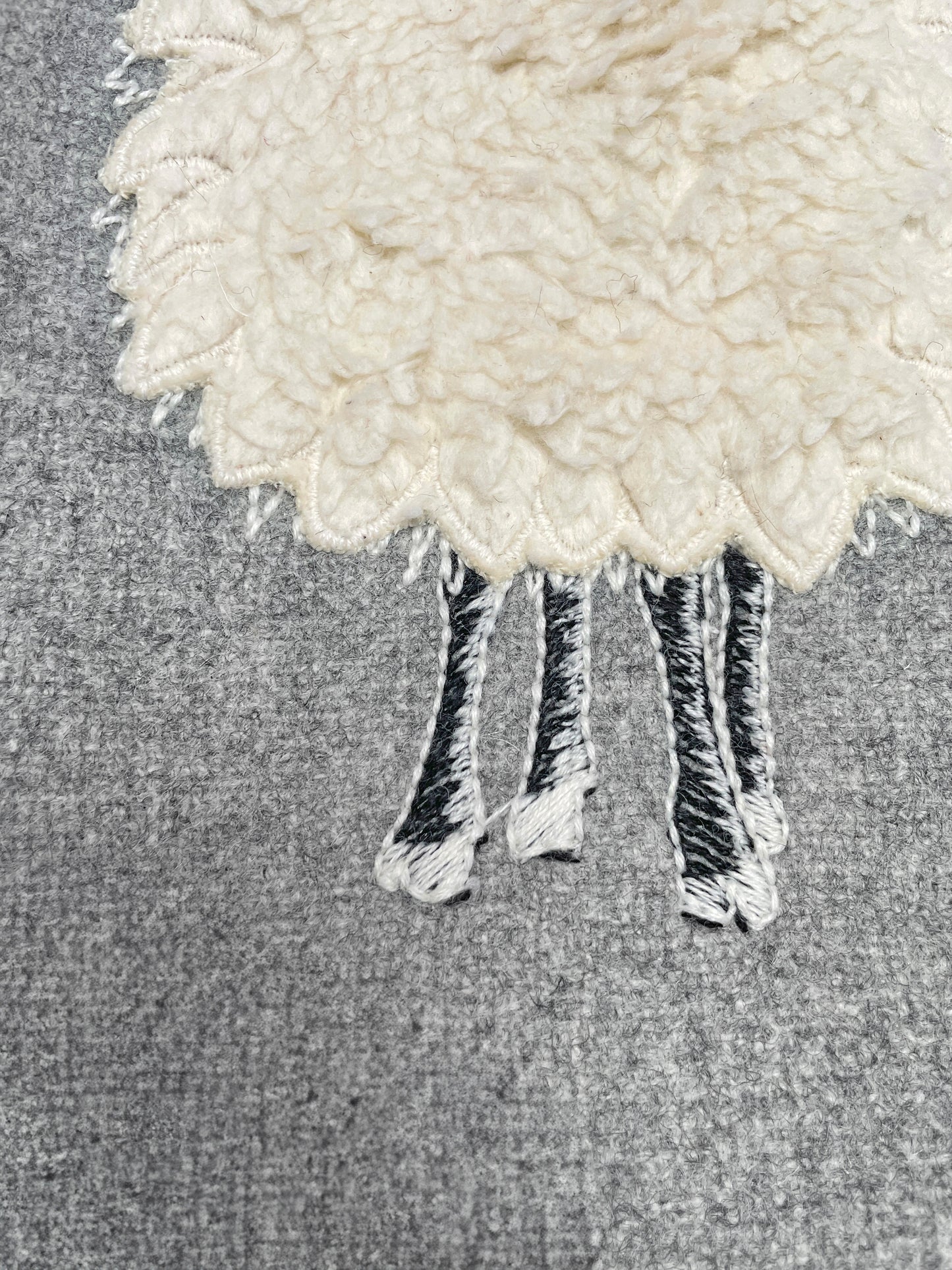 Coussin mouton en laine mélangée