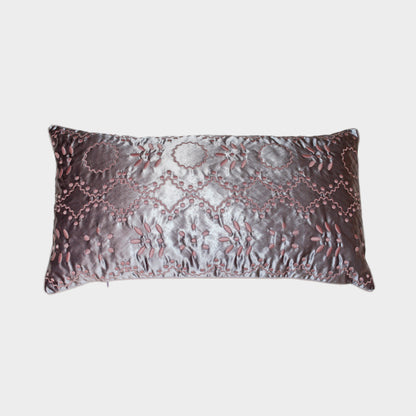 Cushion in shiny broderie anglaise cotton