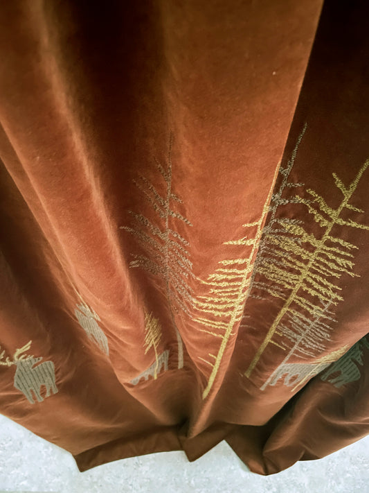 Velvet curtain with embroidery in the woods