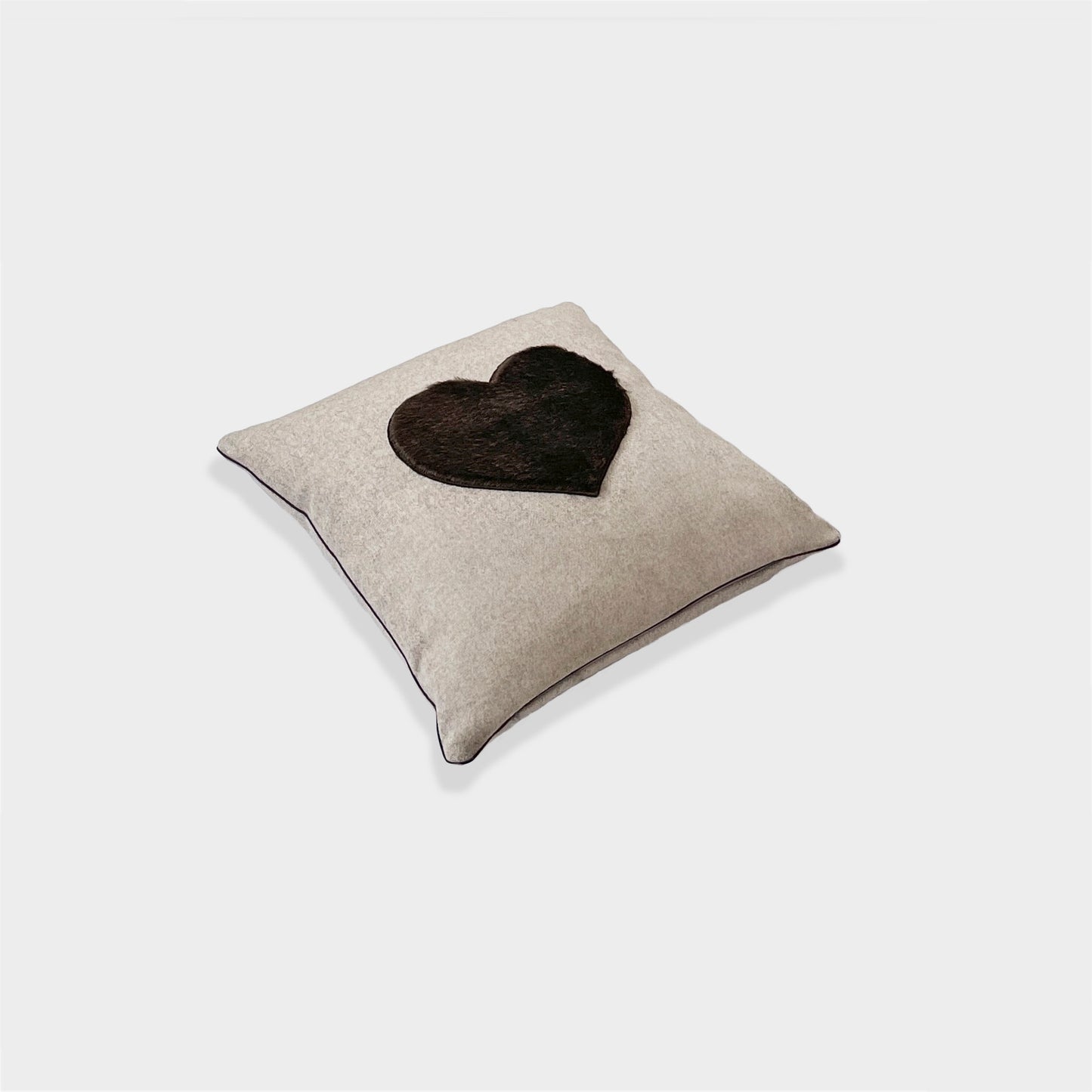 Melange wool cushion with fur heart